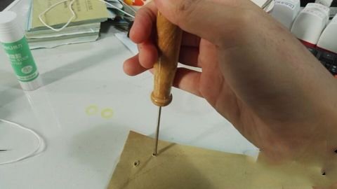 会计凭证三个孔的怎么装订，三个孔要形成三角形怎么装订和穿线