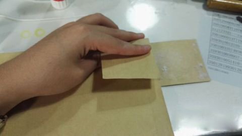 会计凭证三个孔的怎么装订，三个孔要形成三角形怎么装订和穿线