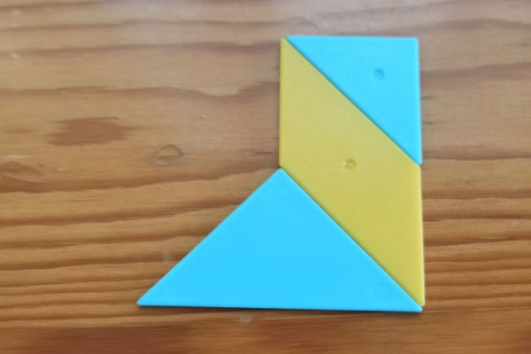 怎样用七巧板拼一个长方形？