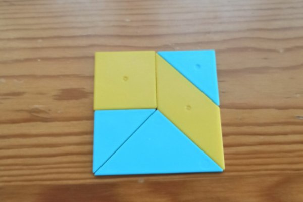 怎样用七巧板拼一个长方形？