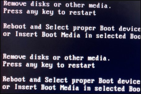 电脑开机出现remove disk or other media,什么原因啊