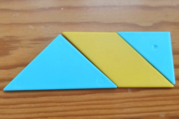 怎样用七巧板拼一个长方形？