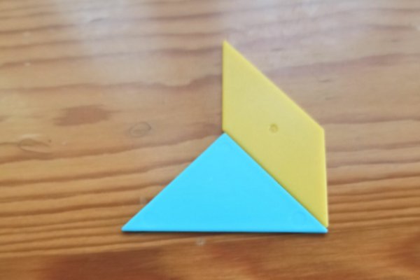 怎样用七巧板拼一个长方形？