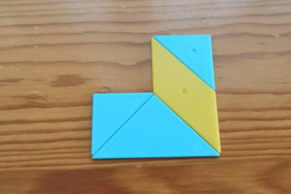 怎样用七巧板拼一个长方形？