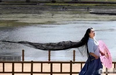 为什么女子留3米长发?