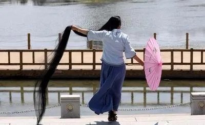 为什么女子留3米长发?