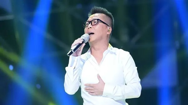 莲花被戴军认出 揭秘蒙面歌王李春波退赛原因